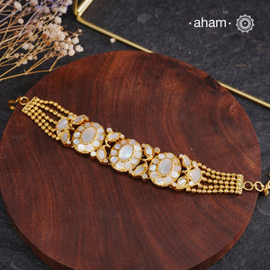 Embrace the allure of timeless elegance with Aham Jewellery’s latest Mother of Pearl collection, a radiant choice for festive celebrations and weddings.

The bracelet is crafted in 92.5 silver and adorned with a luxurious gold polish, capturing the iridescent beauty of mother of pearl.