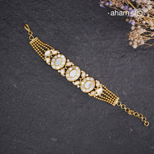 Embrace the allure of timeless elegance with Aham Jewellery’s latest Mother of Pearl collection, a radiant choice for festive celebrations and weddings.

The bracelet is crafted in 92.5 silver and adorned with a luxurious gold polish, capturing the iridescent beauty of mother of pearl.