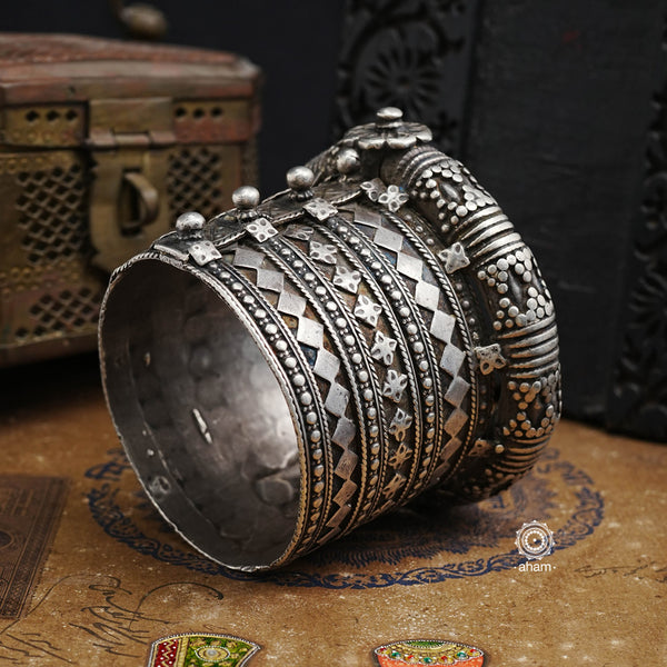 The Kambi Kadla. Typically worn by Rabari and Mehr Women Origin: Gujarat  Vintage silver kada with intricate work, handcrafted by skilful artisans. Beautiful piece from a bygone era, that bring back memories and stories of that time.   Since this is a big size piece we recomend that you team it up with a smaller kada in the front. This one is a beautiful collectors piece and a rare find