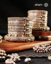 The Kambi Kadla.
Typically worn by Rabari and Mehr Women
Region: Gujarat

Vintage silver&nbsp;kada&nbsp;with intricate work, handcrafted&nbsp;by skilful artisans.&nbsp;Beautiful piece from a bygone era, that bring back memories and stories of that time.&nbsp;

Since this is a big size piece we recommend that you team it up with a smaller kada in the front. This one is a beautiful collectors piece and a rare find.&nbsp;

Price is for a pair. Incase you want to get a single piece please get in touch at 888444