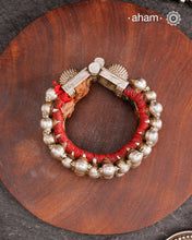 Tribal pauchi with silver bead work, handcrafted by skilful artisans. Beautiful handcuff from a bygone era, that bring back memories and stories of that time. Please note that we have not changed the original cotton threading that you see inside.