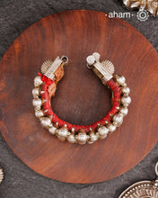 Tribal pauchi with silver bead work, handcrafted by skilful artisans. Beautiful handcuff from a bygone era, that bring back memories and stories of that time. Please note that we have not changed the original cotton threading that you see inside.
