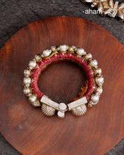 Tribal pauchi with silver bead work, handcrafted by skilful artisans. Beautiful handcuff from a bygone era, that bring back memories and stories of that time. Please note that we have not changed the original cotton threading that you see inside.