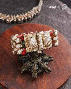 Tribal pauchi with silver bead work, handcrafted by skilful artisans. Beautiful handcuff from a bygone era, that bring back memories and stories of that time. Please note that we have not changed the original cotton threading that you see inside.