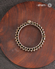 Vintage silver kada with intricate work, handcrafted by skilful artisans.Beautiful piece from a bygone era, that bring back memories and stories of that time. 