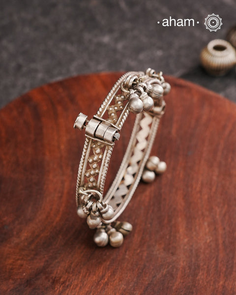 Vintage silver kada, expertly handcrafted by skilled artisans that captures the essence of a bygone era. Its openable design (size 2.2) offers both elegance and practicality, making it a timeless accessory that evokes memories and stories from the past. Perfect for those who appreciate heritage craftsmanship and classic style.