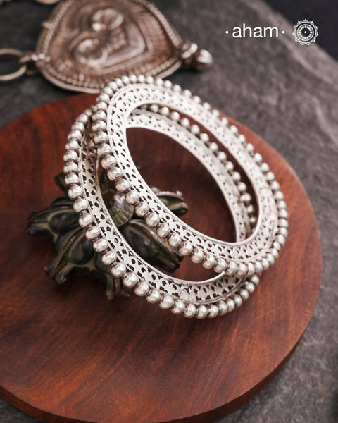 Tribal silver handcrafted by skilful artisans. Beautiful piece from a bygone era, that bring back memories and stories of that time.The price is for Pair.
