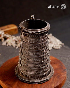 A statement Vintage Silver Hand Cuff. Comes with beautiful tar work and stamp sheet detailing workmanship.
The price is for one piece only.

