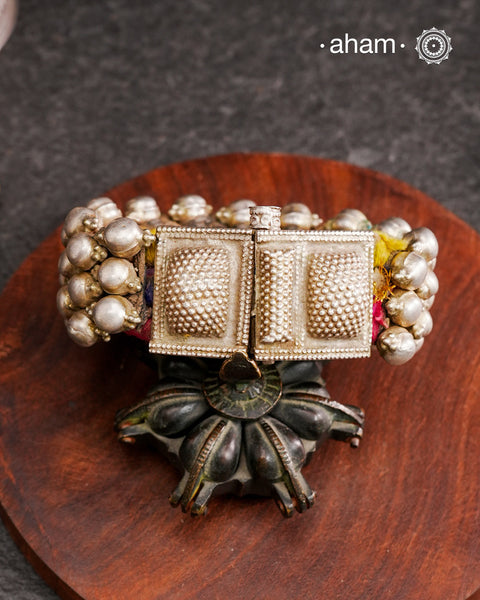 Tribal pauchi with silver bead work, handcrafted by skilful artisans. Beautiful handcuff from a bygone era, that bring back memories and stories of that time.