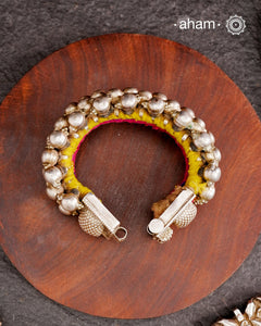 Tribal pauchi with silver bead work, handcrafted by skilful artisans. Beautiful handcuff from a bygone era, that bring back memories and stories of that time.