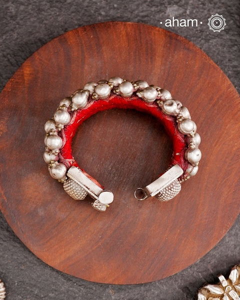 Tribal pauchi&nbsp;with silver bead work, handcrafted by skilful artisans. Beautiful handcuff from a bygone era, that bring back memories and stories of that time. Please note that we have not changed the original cotton threading that you see inside.