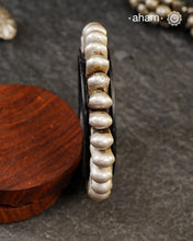Vintage Silver Kada from Rajasthan. Beautiful piece from a bygone era, that bring back memories and stories of that time. Comes with a plastic bangle inside. Super light. Works great for stacking. The price is for one piece only.