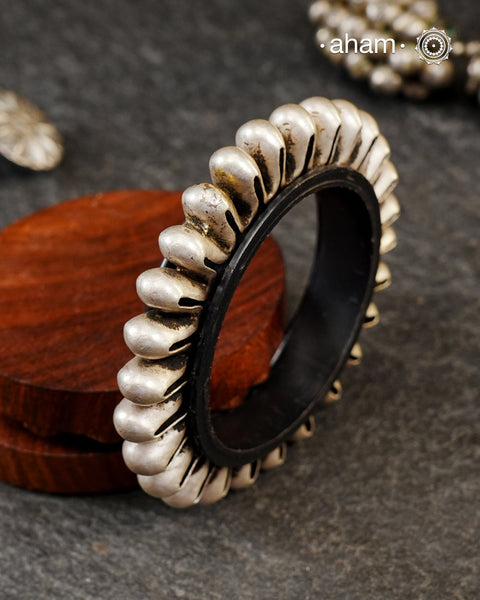 Vintage Silver Kada from Rajasthan. Beautiful piece from a bygone era, that bring back memories and stories of that time. Comes with a plastic bangle inside. Super light. Works great for stacking. The price is for one piece only.