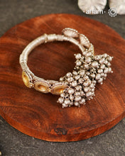 Two Vintage earrings have been wrapped with silver wire and converted in to a beautiful open cuff