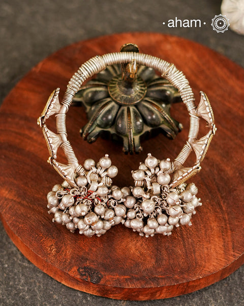 Two Vintage earrings have been wrapped with silver wire and converted in to a beautiful open cuff