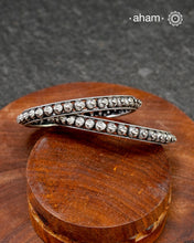 Bangles handcrafted in 92.5 silver by master craftsman in Kolhapur.