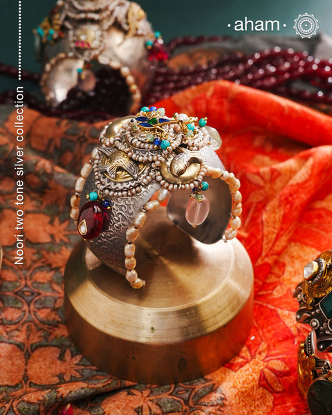 One of a kind statement wearable art pieces.
An eclectic mix of elements, with a play of colours, textures, forms and workmanship. Crafted in 92.5 Sterling Silver with two tones that make them so versatile and unique.Modern Heirloom pieces that can be worn across generations.

The price is for one piece kada only.