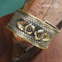 One of a kind statement wearable art pieces.Silver hand kada with a beautiful weave pattern, gold highlights and lapiz stone