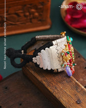 The Noori Two Tone Silver Pauchi is a beautiful and versatile piece of jewelry. The center turquoise highlight and dual tone kundan pieces add a touch of drama to the design. Expertly crafted, it is eclectic and unique. Elevate any outfit with this statement piece.
The price is for one piece kada only.