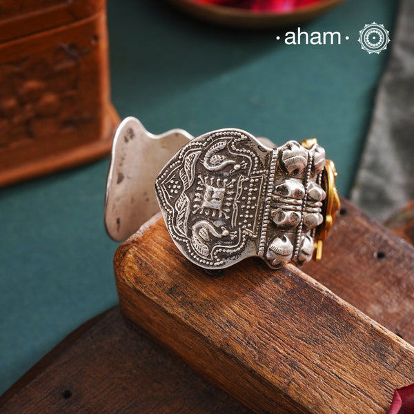 One of a kind statement wearable art pieces.
Silver hand kada with two tone gold highlights. A striking turquoise piece in the center with kundan work and beautiful birds on the side. Handcrafted in 92.5 silver.


The price is for one piece kada only.