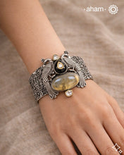 One of a kind statement wearable art pieces.
Silver hand kada with two tone gold polish kundan work.