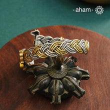 Noori Cow hand cuff with a play of colours, textures, forms and workmanship. Crafted in 92.5 Sterling Silver with two tones that make them so versatile and unique.