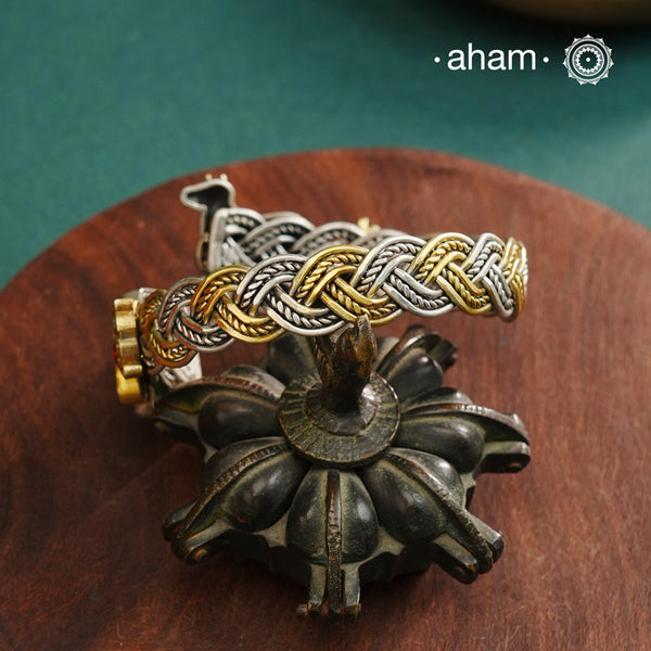 Noori Cow hand cuff with a play of colours, textures, forms and workmanship. Crafted in 92.5 Sterling Silver with two tones that make them so versatile and unique.