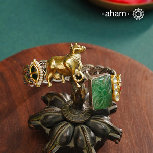 Noori Cow hand cuff with a play of colours, textures, forms and workmanship. Crafted in 92.5 Sterling Silver with two tones that make them so versatile and unique.