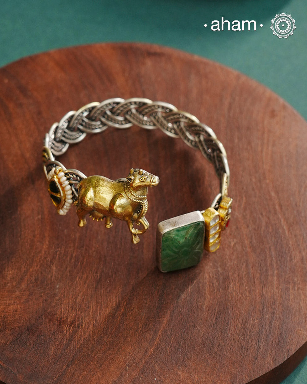 Noori Cow hand cuff with a play of colours, textures, forms and workmanship. Crafted in 92.5 Sterling Silver with two tones that make them so versatile and unique.
