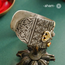 Noori hand cuff with a play of colours, textures, forms and workmanship. Crafted in 92.5 Sterling Silver with two tones, coral and kundan that make them so versatile and unique.