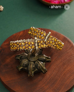 Enhance your style with the timeless elegance of the Dual Tone Silver Kada. Handcrafted by skilled karigars in Barmer, Rajasthan, this earring features traditional Bandhel work, where a thin sheet of hand beaten&nbsp;22 carat gold is set on 92.5 silver using a unique wax setting technique. A classic representation of fine Indian craftsmanship.
Comes as a pair.
