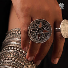 his classic Rava Silver Ring is crafted from 92.5 sterling silver with a unique fine rava work. Adjustable to fit any finger size, it's the perfect accessory to add a touch of elegance to any look.