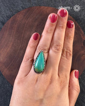 Handcrafted 92.5 sterling silver ring with turquoise stone.