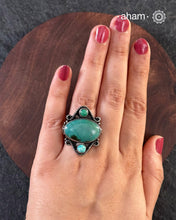 Handcrafted 92.5 sterling silver ring with turquoise stone setting.