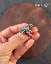 Handcrafted 92.5 sterling silver ring with turquoise stone setting.