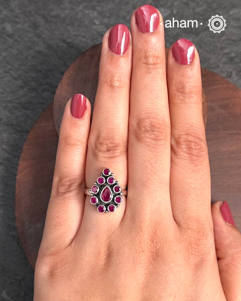 Summer Love Flower Silver Ring in 92.5 sterling silver with maroon Stone setting.
A versatile ring that works great with your Indian outfits.