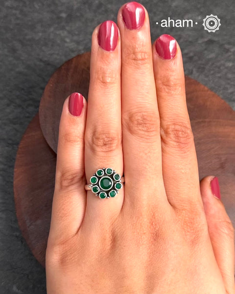 Summer Love Flower Silver Ring in 92.5 sterling silver with green stone setting.&nbsp;
A versatile ring that works great with your Indian outfits.