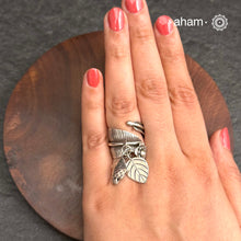 Adjustable Ring in 92.5 sterling silver with different charms.
Perfect piece to add a playful tough to your look.