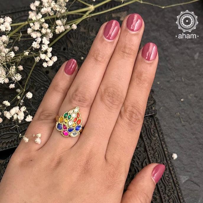 This Navratna Gold Polish Silver Ring is a beautiful and unique piece of jewellery. Its classic design makes it a timeless and elegant addition to any wardrobe. Made with fine silver which is gold plated, this ring is sure to impress.