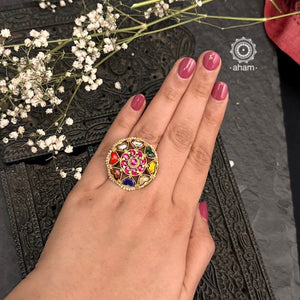 Festive gold polish adjustable ring with Navratna Stone, handcrafted in silver. Perfect for special occasions and festivities. 