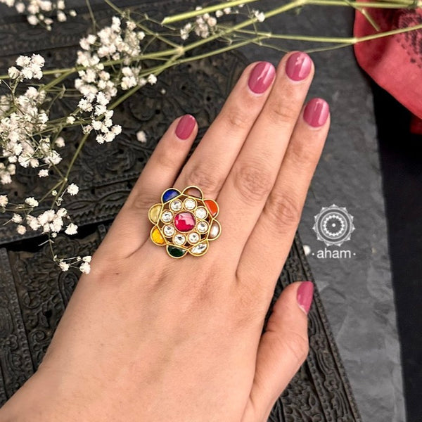 This Navratna Gold Polish Silver Ring is a beautiful and unique piece of jewellery. Its classic design makes it a timeless and elegant addition to any wardrobe. Made with fine silver which is gold plated, this ring is sure to impress.