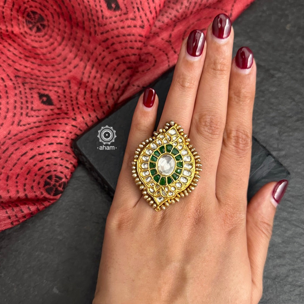 Festive gold polish adjustable ring handcrafted in silver with fine Kundan work. Perfect for special occasions and celebrations. 