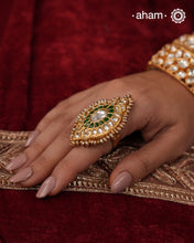 Festive gold polish adjustable ring handcrafted in silver with fine Kundan work. Perfect for special occasions and celebrations.