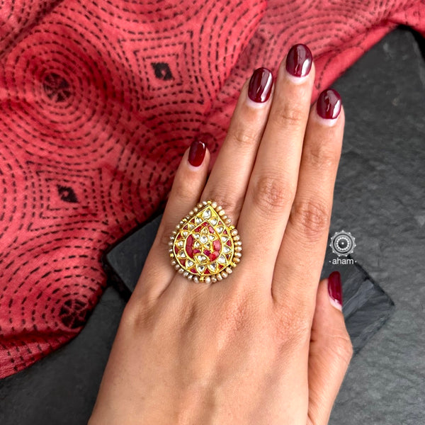 Festive gold polish adjustable ring handcrafted in silver with fine Kundan work. Perfect for special occasions and celebrations. 