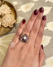 This stunning Sterling Silver Ring features a classic Victorian era style crafted with an elegant dull gold polish adorned with pink Kundan highlights. An exquisite representation of traditional design, perfect for any special occasion.