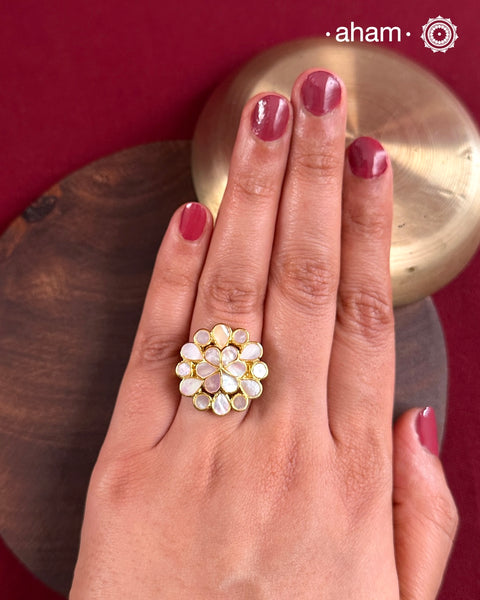 Embrace the allure of timeless elegance with Aham Jewellery’s latest Mother of Pearl collection, a radiant choice for festive celebrations and weddings.
The ring is crafted in 92.5 silver and adorned with a luxurious gold polish, capturing the iridescent beauty of mother of pearl.This collection is designed with festivities, bridesmaids, and destination weddings in mind, offering a versatile blend of tradition and contemporary charm. 