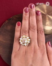 Embrace the allure of timeless elegance with Aham Jewellery’s latest Mother of Pearl collection, a radiant choice for festive celebrations and weddings.The ring is crafted in 92.5 silver and adorned with a luxurious gold polish, capturing the iridescent beauty of mother of pearl.This collection is designed with festivities, bridesmaids, and destination weddings in mind, offering a versatile blend of tradition and contemporary charm. 