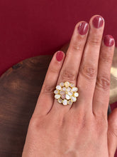 Embrace the allure of timeless elegance with Aham Jewellery’s latest Mother of Pearl collection, a radiant choice for festive celebrations and weddings.The ring is crafted in 92.5 silver and adorned with a luxurious gold polish, capturing the iridescent beauty of mother of pearl.This collection is designed with festivities, bridesmaids, and destination weddings in mind, offering a versatile blend of tradition and contemporary charm. 