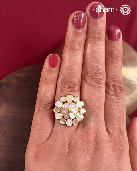 Embrace the allure of timeless elegance with Aham Jewellery’s latest Mother of Pearl collection, a radiant choice for festive celebrations and weddings.The ring is crafted in 92.5 silver and adorned with a luxurious gold polish, capturing the iridescent beauty of mother of pearl.This collection is designed with festivities, bridesmaids, and destination weddings in mind, offering a versatile blend of tradition and contemporary charm. 