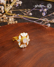 Embrace the allure of timeless elegance with Aham Jewellery’s latest Mother of Pearl collection, a radiant choice for festive celebrations and weddings.The ring is crafted in 92.5 silver and adorned with a luxurious gold polish, capturing the iridescent beauty of mother of pearl.This collection is designed with festivities, bridesmaids, and destination weddings in mind, offering a versatile blend of tradition and contemporary charm. 